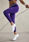 Леггинсы Nike, фиолетовый